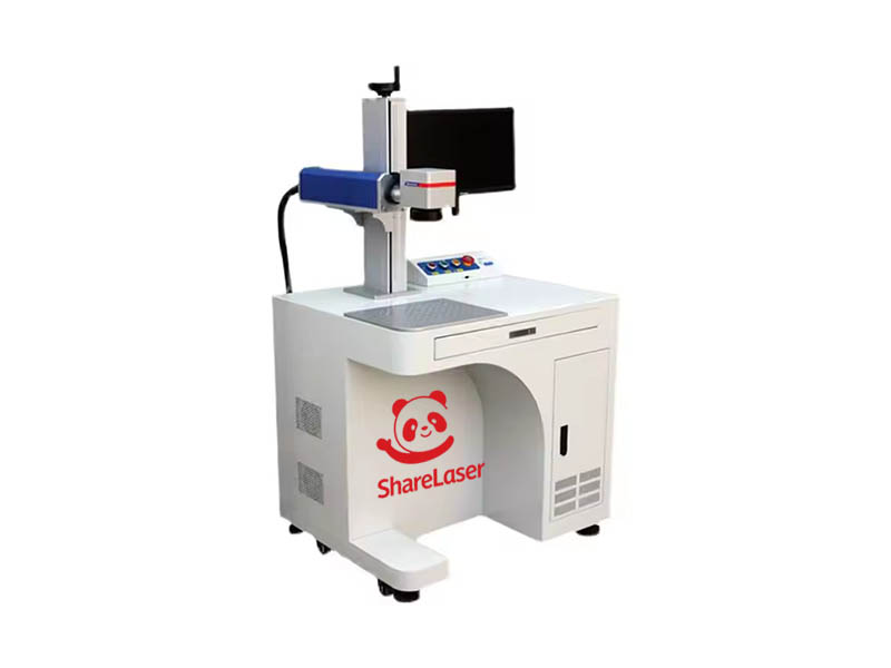 Laser marking machine including computer
